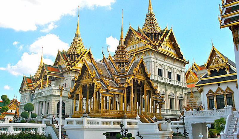 A bustling market scene in Bangkok showcasing street food stalls